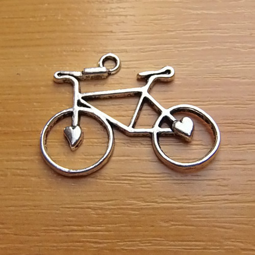 Kolo - stříbro - 31mm x 23mm — foto 1