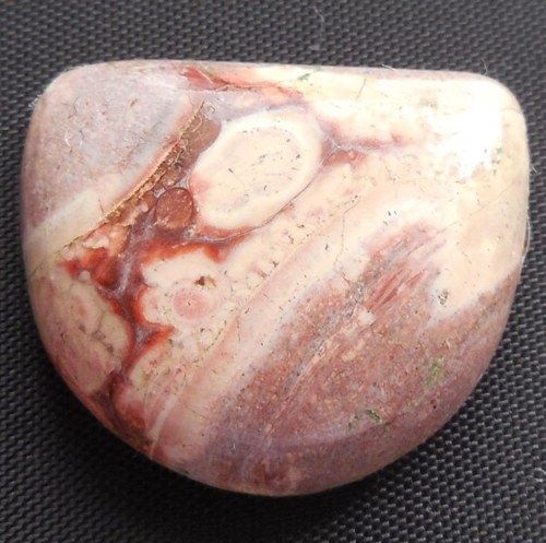 Ryolit "Ptačí oko" - kabošon (21 x 18 x 6 mm)