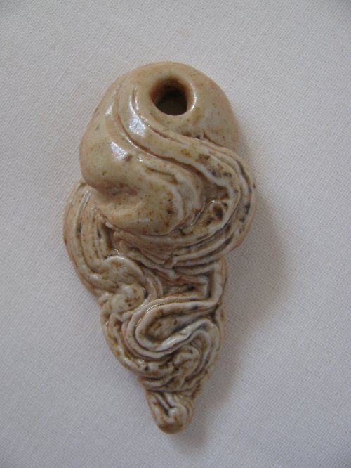 Porcelánový přívěsek — foto 1