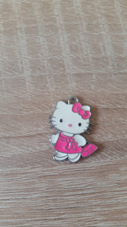 Hello Kitty s kabelkou malinová — foto 1