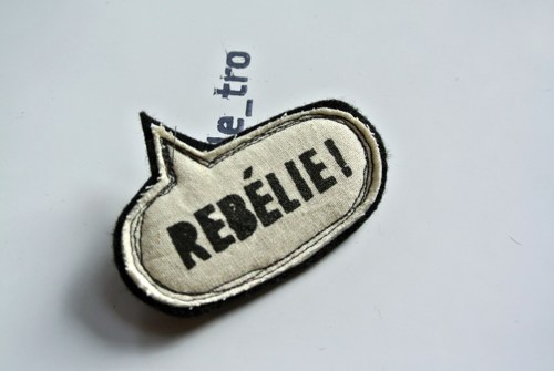Brož REBÉLIE! — foto 1