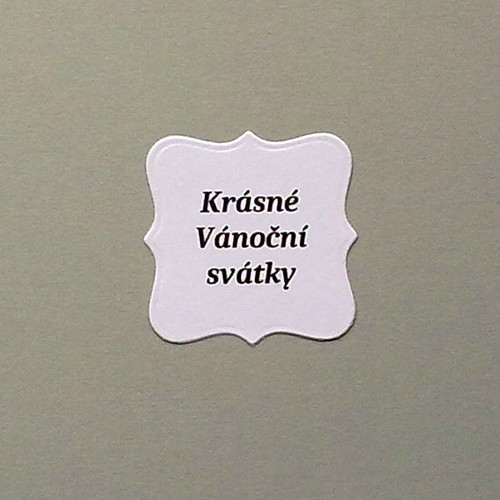 Embosovaný štítek s nápisem