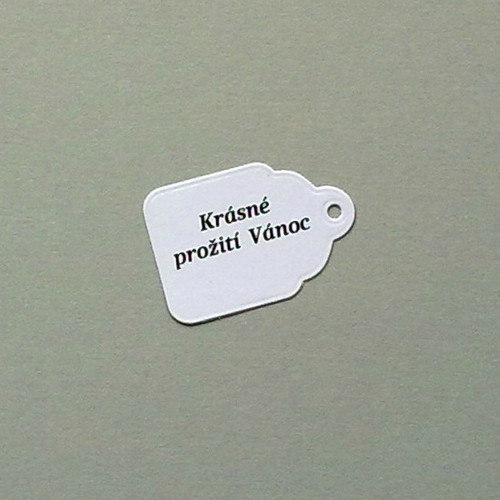 Embosovaná visačka s nápisem