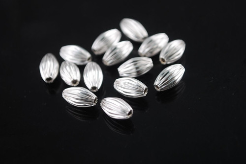 Kovové korálky, 10x6 mm, 10 ks