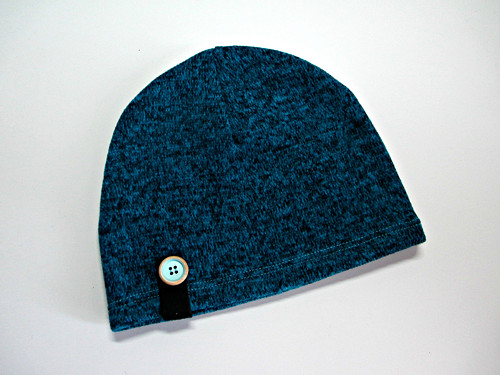 Čapka jarní - knoflík — foto 1