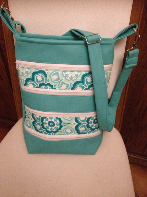 Crossbody tyrkys — foto 1