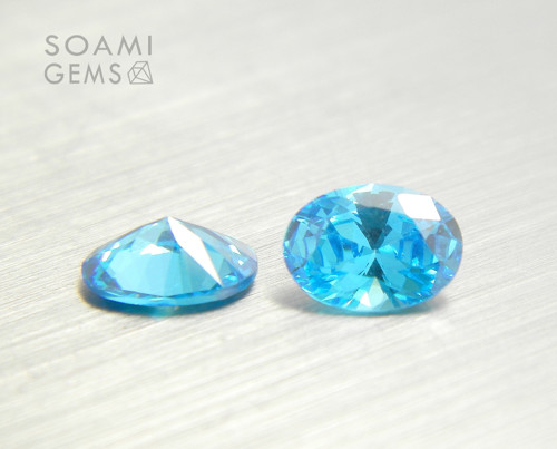 Zirkon kubický VVS modrý topaz 7x5 mm ovál — foto 1