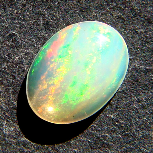 Ethiopský Welo opál - kabošon 0,5ct — foto 1