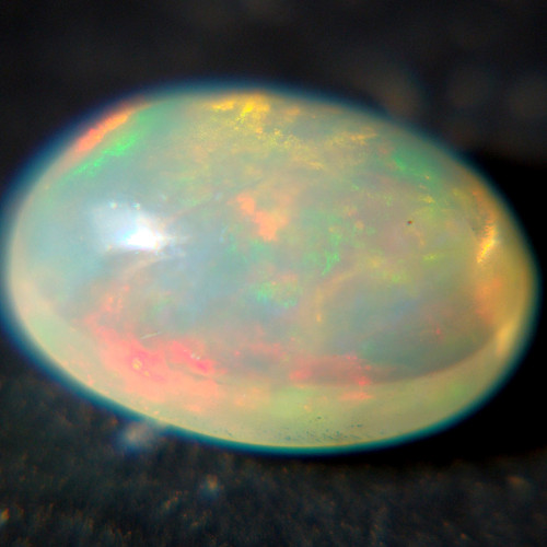 Ethiopský Welo opál - kabošon 0,65ct — foto 1