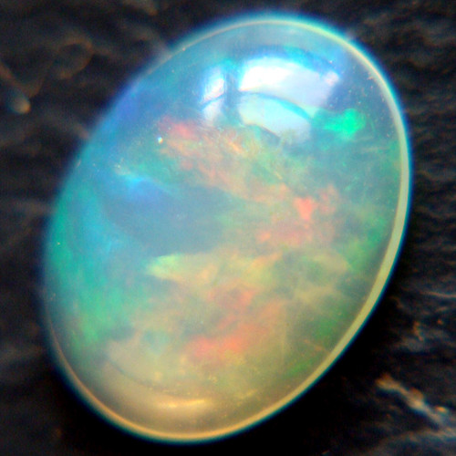 Ethiopský Welo opál - kabošon 0,35ct — foto 1