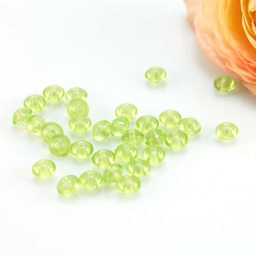 Skleněné žlutozelené korálky ČR 5,5x4mm - 64ks
