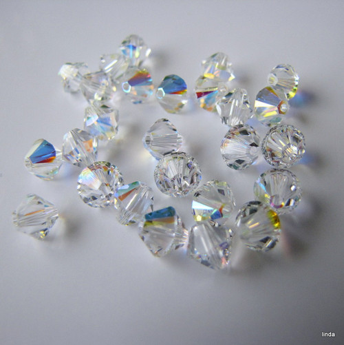 SWAROVSKI * ELEMENTS * sluníčko 6mm * 2ks / bal