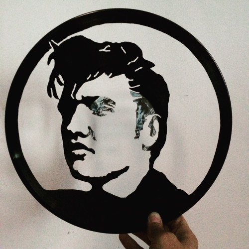Elvis Presley portrét ručně vyřezán do gramodesky