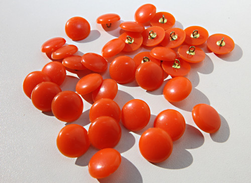 Knoflíky plastové pecky