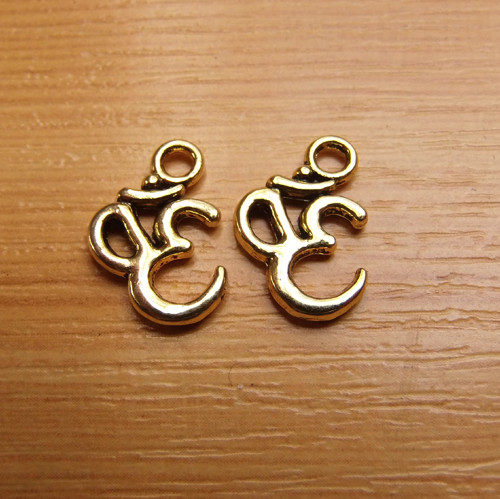 Znak "Óm" - "zlato" - 16mm x 11mm