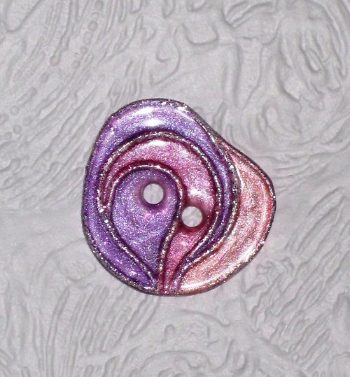 Knoflíček — foto 1