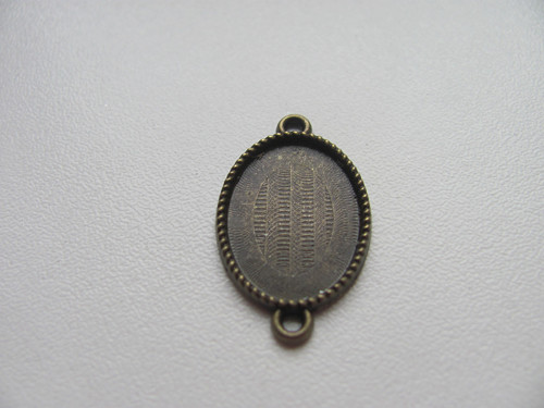 Kovové lůžko bronz oválné - 13x18 mm