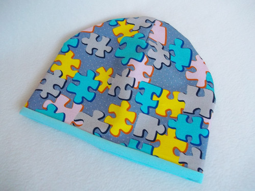 Čepice oboustranná (Puzzle) vel 50-52