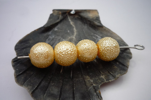Žluté vroubkované perly "Zigana" 8 mm 20 ks