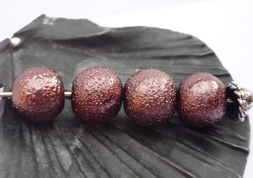 Hnědé vroubkované perly "Zigana" 8 mm 20 ks