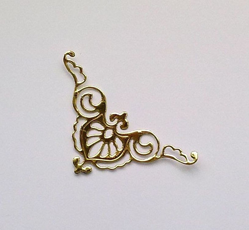 Výsek - Rohový ornament (zlatá lesklá)