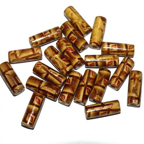 Dřevěné korálky - vzorované 7 x 20 mm (cena 22ks)