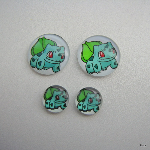 Kabošon * dinosaurus * 12mm (20mm) * 2ks / bal
