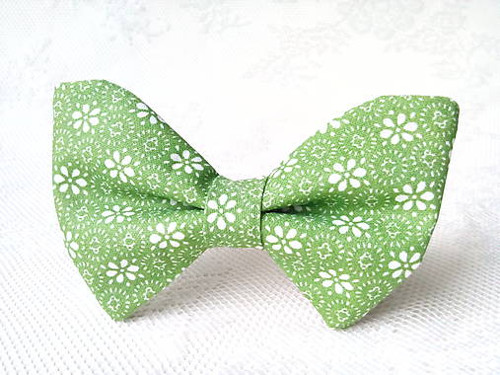 Green bow tie with white flowers