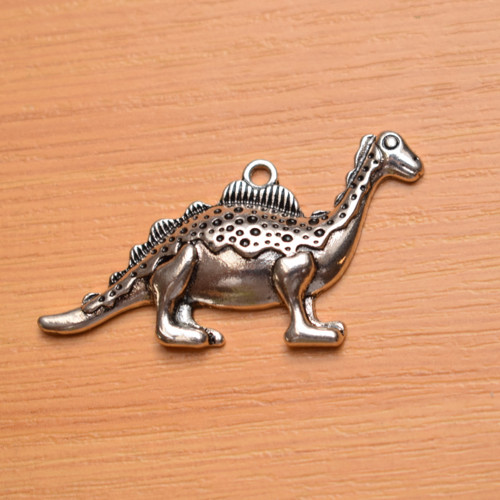 Dinosaurus - starostříbro - 27mm x 45mm — foto 1
