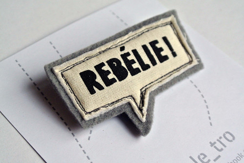 Brož REBÉLIE! — foto 1