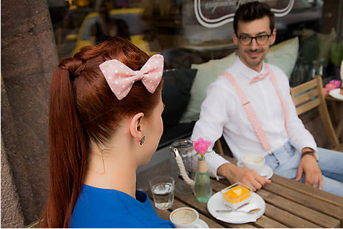Light pink bow tie with white polka dots
