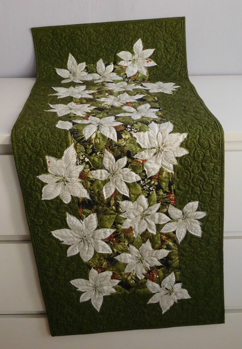 Běhoun - poinsetie — foto 1