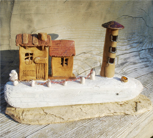 Přímořská osada s majákem - driftwood — foto 1