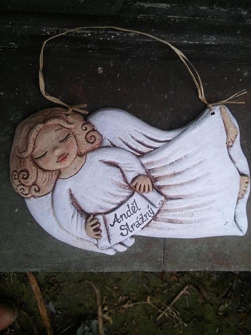 Andílek letící , reliéf — foto 1