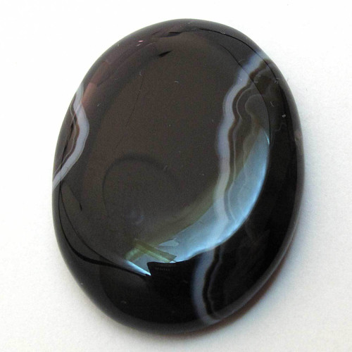 Kabošon černý onyx ovál 33mm — foto 1