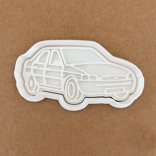 Vykrajovátko - Ford Escort — foto 1
