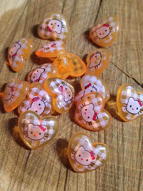 Knoflík Kitty oranžový