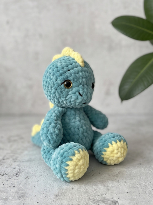 Háčkovaný dinosaurus