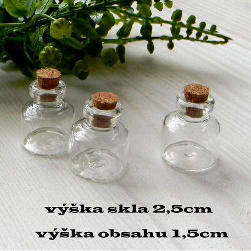 Skleněná láhev-výš.skla 2,5cm-výš.obsahu 1,5cm