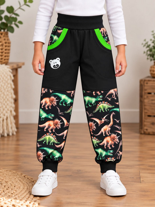 Softshellové kalhoty 110/116 dinosauři na černé