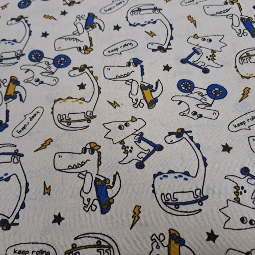 Bavlněná látka DINOSAUŘI — foto 1