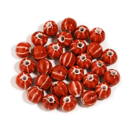Keramický korálek pruhovaný červený 10mm, 2ks