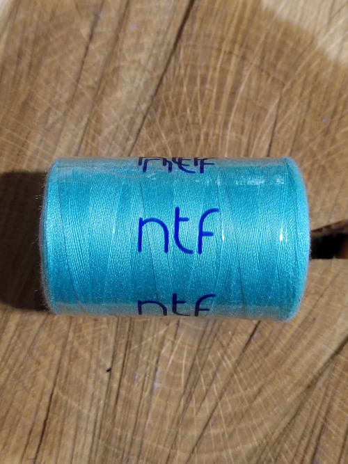 Polyesterové nitě NTF 1000 m 608 mint — foto 1