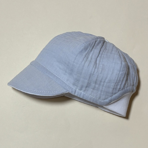 Mušelín - kšiltovka oboustranná (vel.40/44)