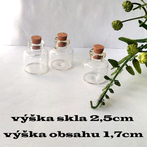 Skleněná láhev-výš.skla 2,5cm-výš.obsahu 1,7cm
