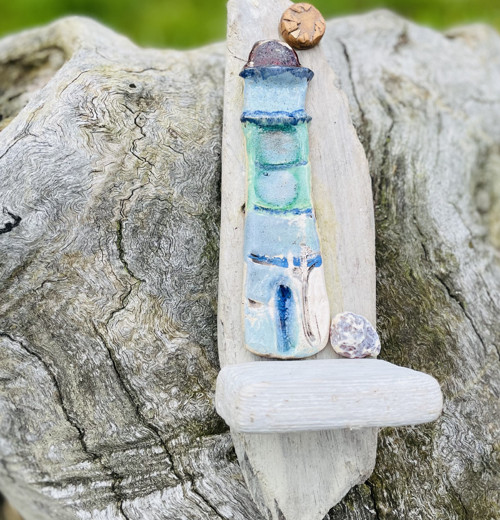 Kramika A Driftwood, Polička A Maják