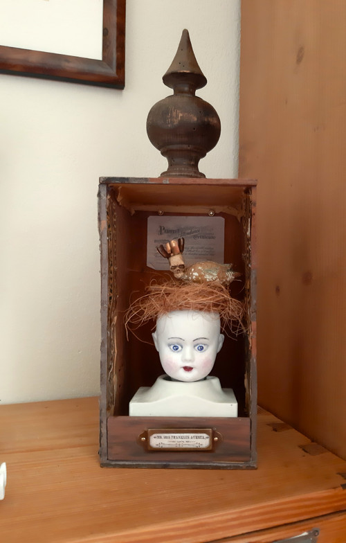 Porcelánová hlavička s hnízdem — foto 1