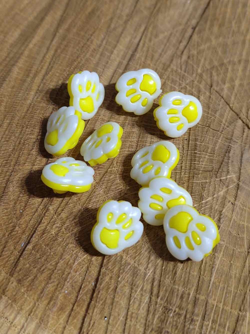 Knoflík dětský packa barva žlutá