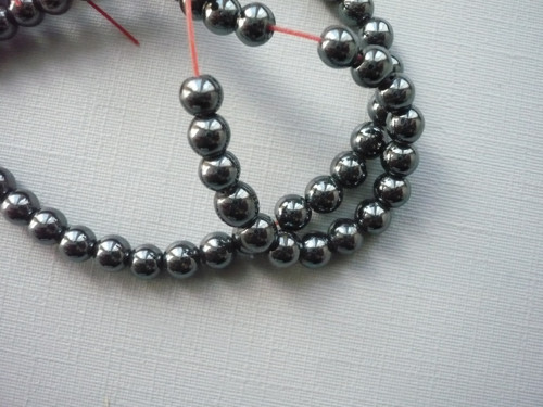 Vrtané kuličky 5 mm - hematit, 2 ks