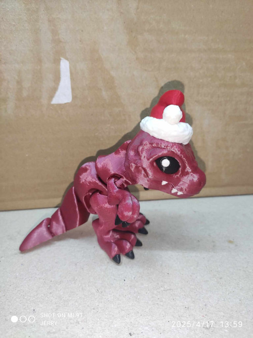 Vánoční T-Rex s čepicí